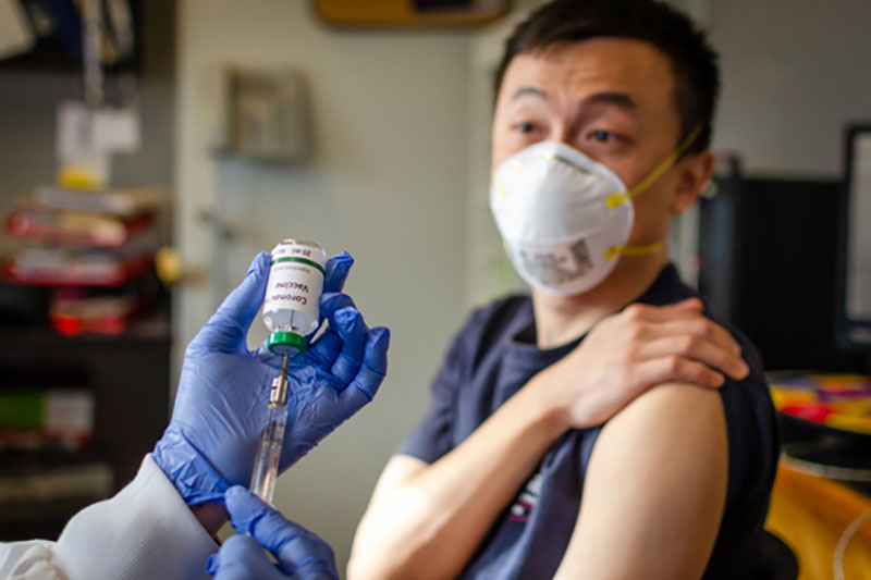 Man receiving a vaccine