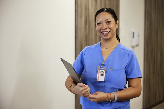 Photo of a clinical nurse with a clipboard